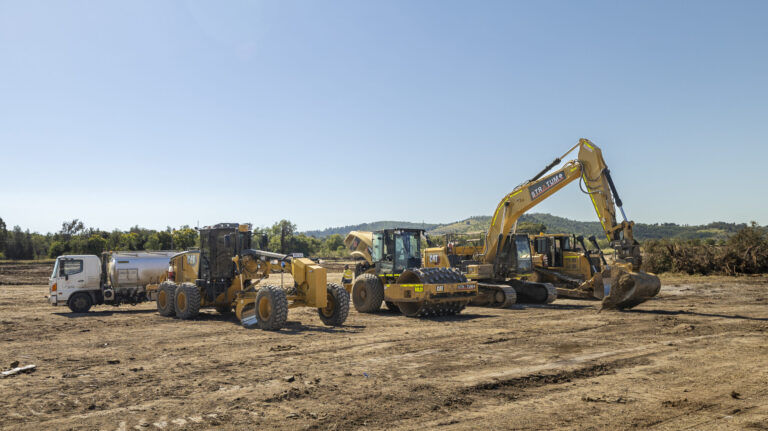 Ongoing civil works at Laidley Plainland Road, Plainland, showcasing road construction, tree clearing, and underground service installation for a rural residential subdivision.