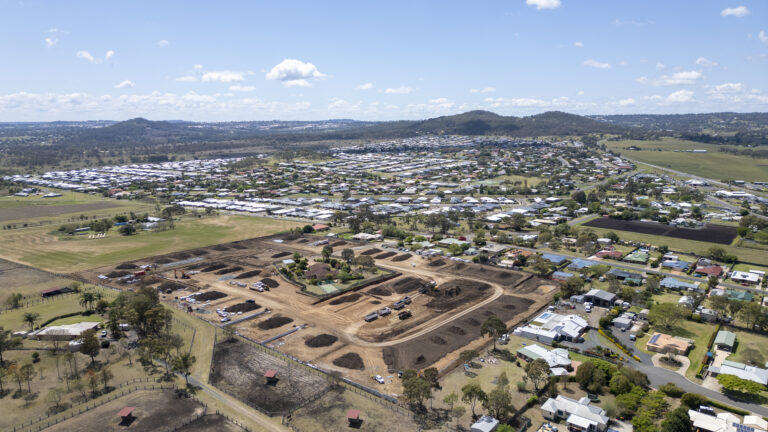 Ongoing civil works at Katrina Court, Westbrook, Toowoomba, showing tree clearing, road construction, and underground services for a 55-lot residential development.