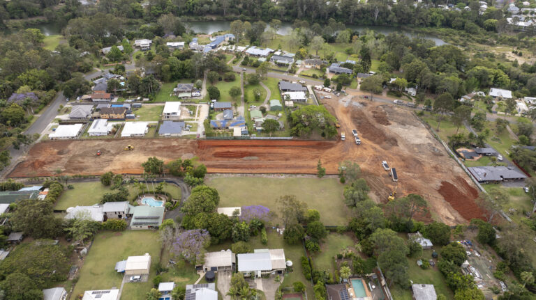 Ongoing civil works at Willow, Lawnton, featuring tree clearing, road construction, and underground services for a 38-lot residential development.