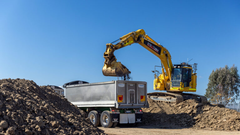 Ongoing civil works at Katrina Court, Westbrook, Toowoomba, showing tree clearing, road construction, and underground services for a 55-lot residential development.