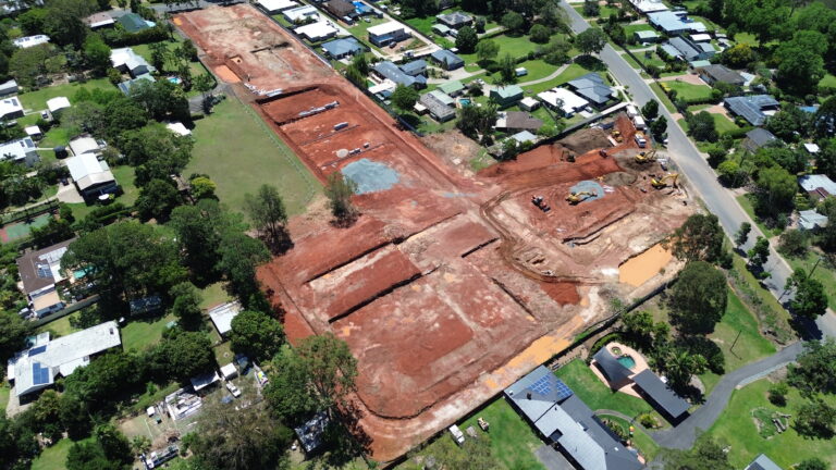 Ongoing civil works at Willow, Lawnton, featuring tree clearing, road construction, and underground services for a 38-lot residential development.