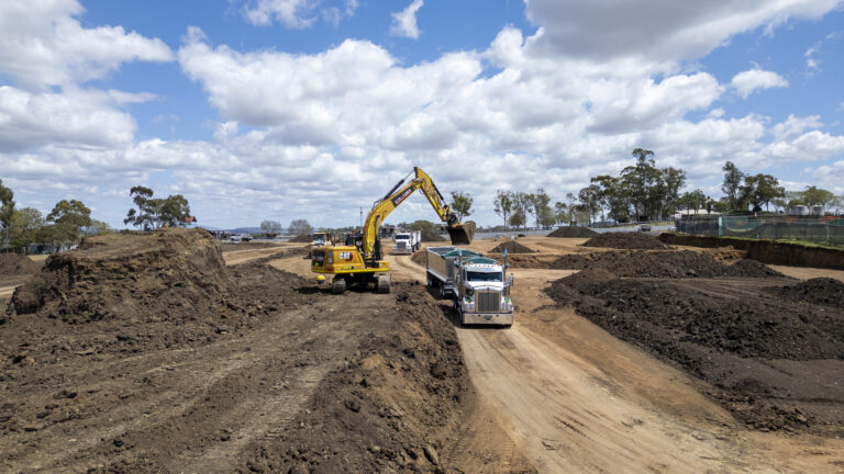 Ongoing civil works at Katrina Court, Westbrook, Toowoomba, showing tree clearing, road construction, and underground services for a 55-lot residential development.
