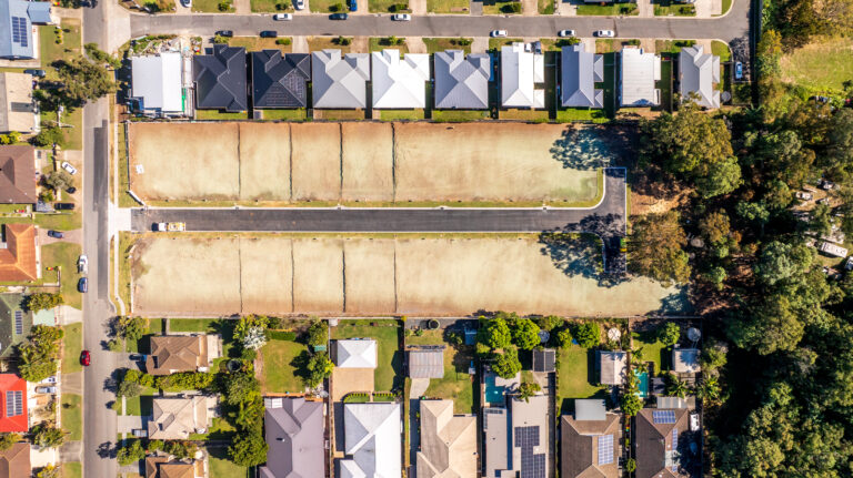Aerial view of the completed residential subdivision at Algester, Brisbane, showcasing roadworks, underground services, and site preparation.