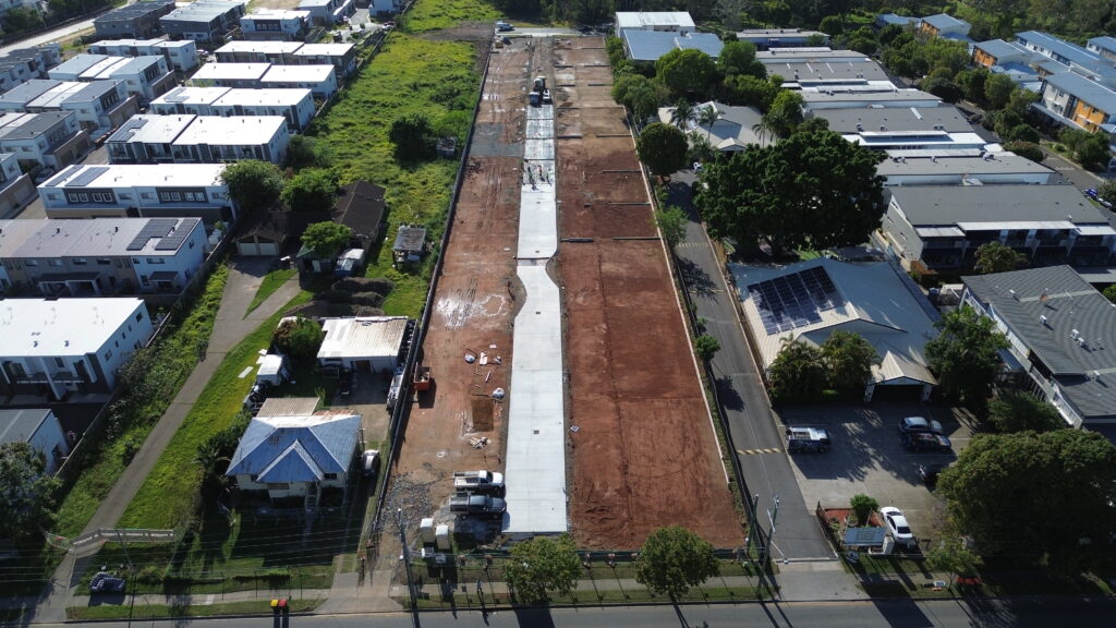Aerial view of a civil construction subdivision at Hanford Road, showcasing earthworks, road preparation, and site development.