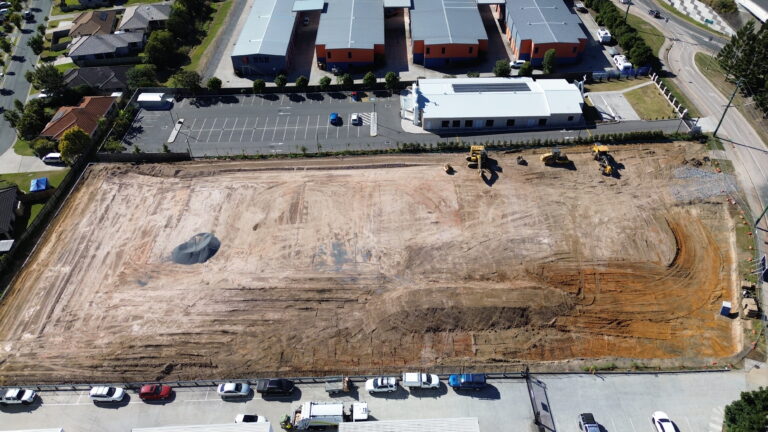 Aerial view of the commercial development site at Middle Road, Hillcrest, featuring bulk earthworks and retaining wall construction.