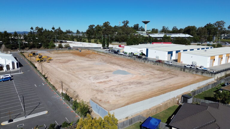 Aerial view of the commercial development site at Middle Road, Hillcrest, featuring bulk earthworks and retaining wall construction.