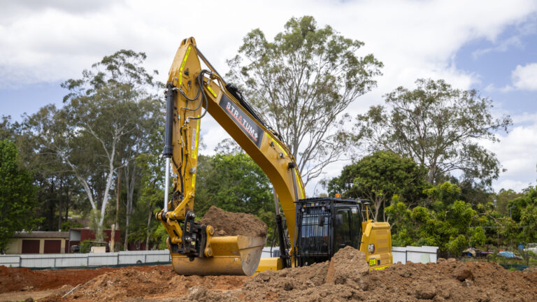 Ongoing civil works at Willow, Lawnton, featuring tree clearing, road construction, and underground services for a 38-lot residential development.